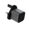 Supertiny - The smallest 65W GaN Charger ever - US - Compact black 65W GaN charger with UK three-pin plug and single USB-C port. - Rolling Square